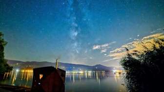 Tent sauna at night and starry sky