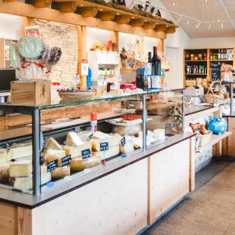 Modern sales room of the Bangshof farm shop in Liechtenstein with regional products such as cheese, yoghurt and fruit.