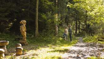 Wooden figure on the Walser Legend Trail
