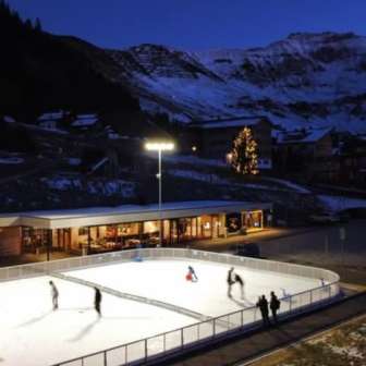 Schlucher meeting place with ice rink in winter