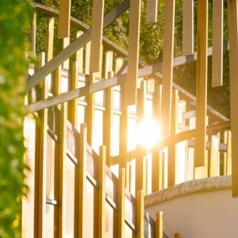 Detail of the golden slats of the façade of the Vaduz Art Centre against the sun.
